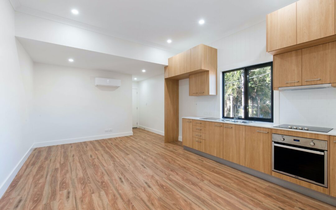 Can I lay laminate flooring over existing hardwood floors?