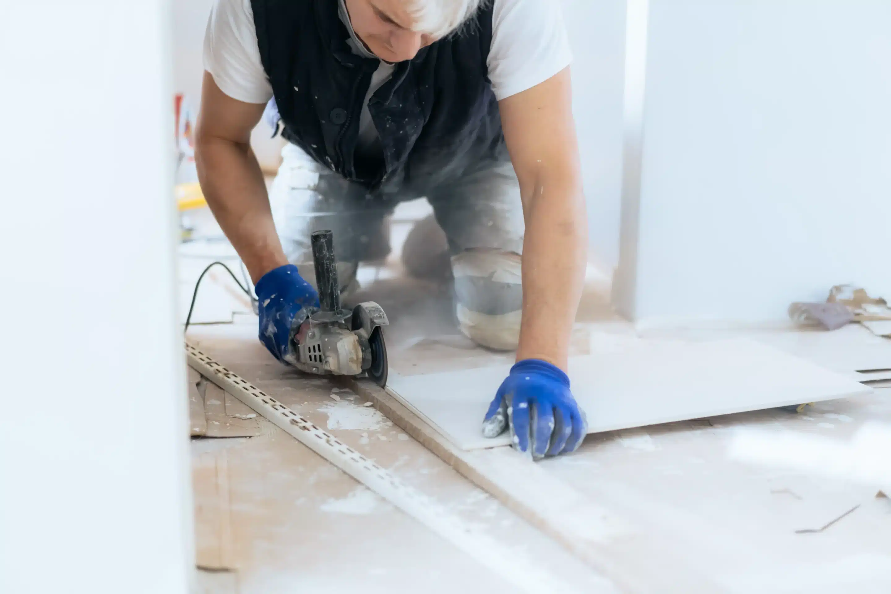 man doing durable bathroom flooring installation Allen TX