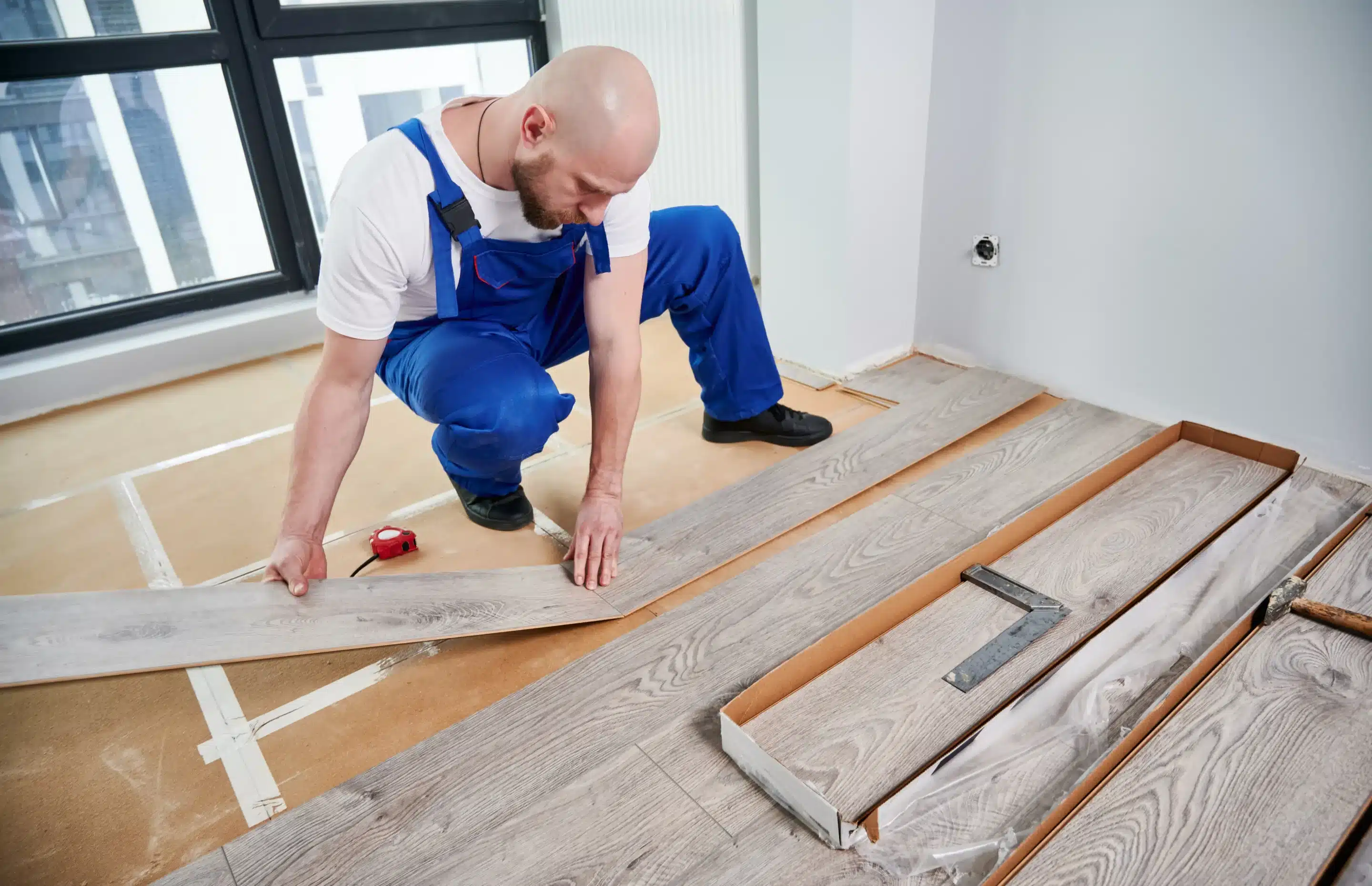 man in what is engineered hardwood flooring